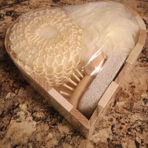 Heart-shaped bath gift set with loofah and brush. Perfect for a relaxing bath